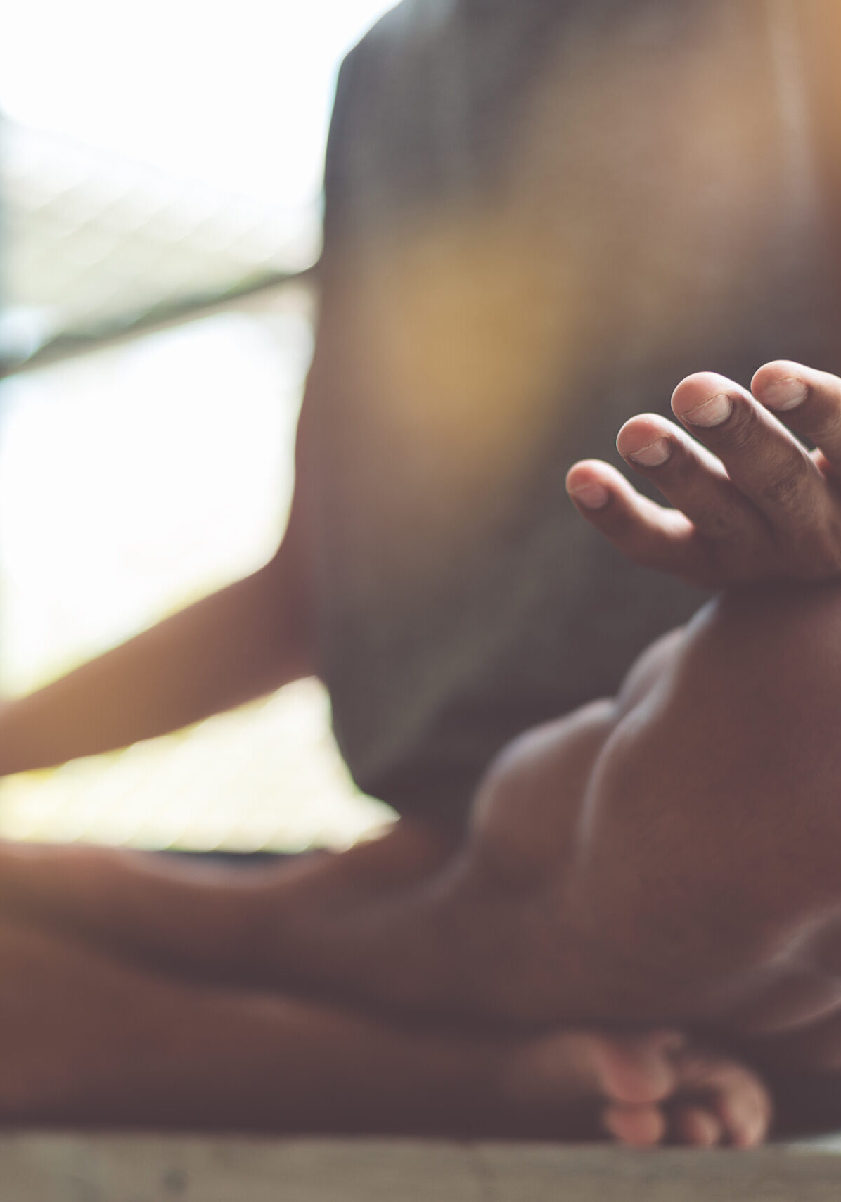 Young attractive boy exercising,asian man practicing meditation indoors, Yoga and Healthy lifestyle concept.
